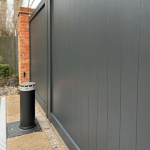 Automatic bollard in front of the gate