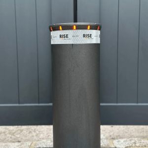 Automatic bollard in front of the gate